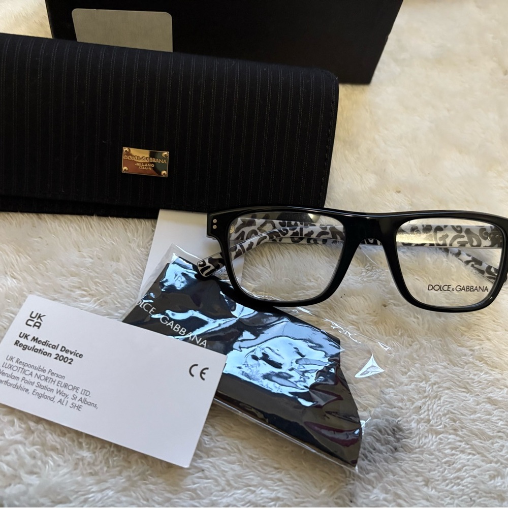 DOLCE & Gabbana with purchase receipt